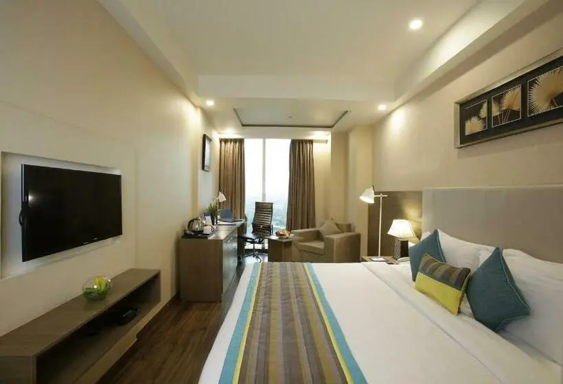 キングサイズベッドのスーペリアルーム, Golden Tulip Suites Gurgaon
