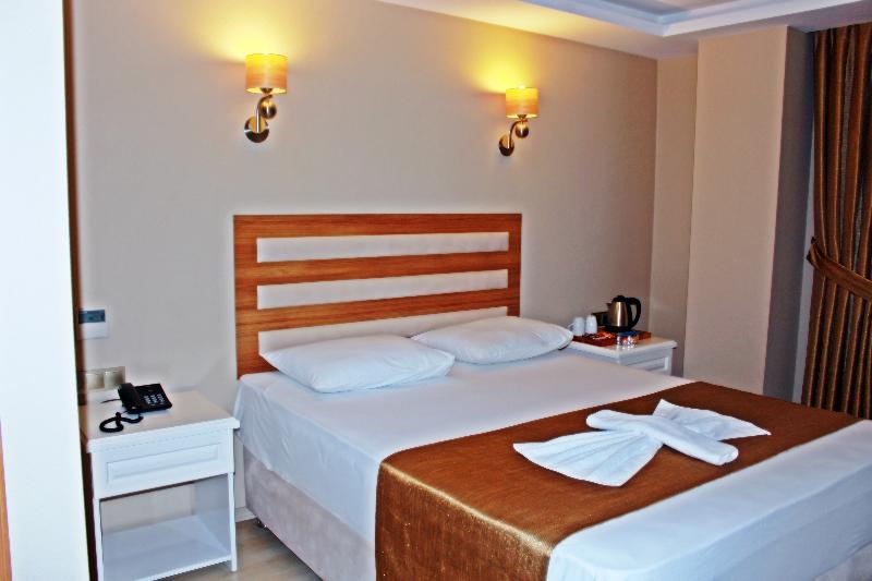 Quarto standard vista mar lateral, Feza Otel