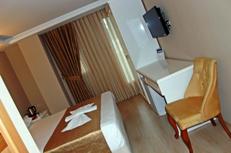 اتاق اساندارد با چشم‌انداز جانبی به دریا, Feza Otel