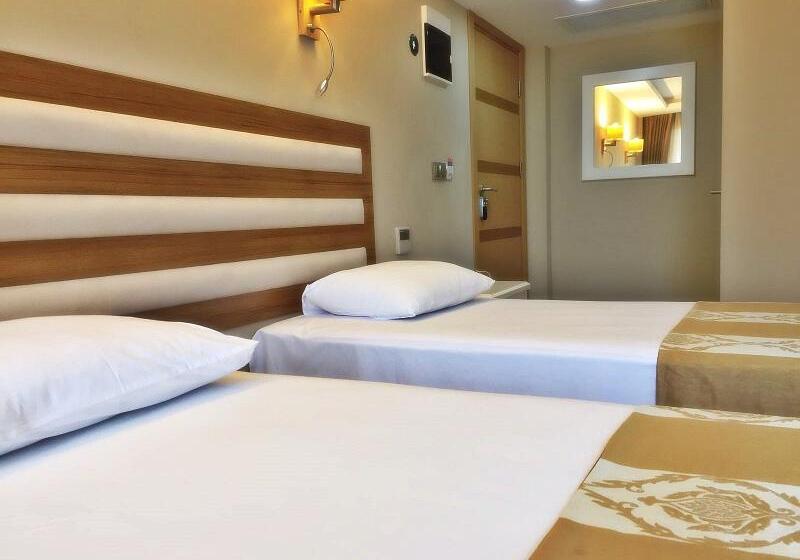 Quarto standard vista mar lateral, Feza Otel