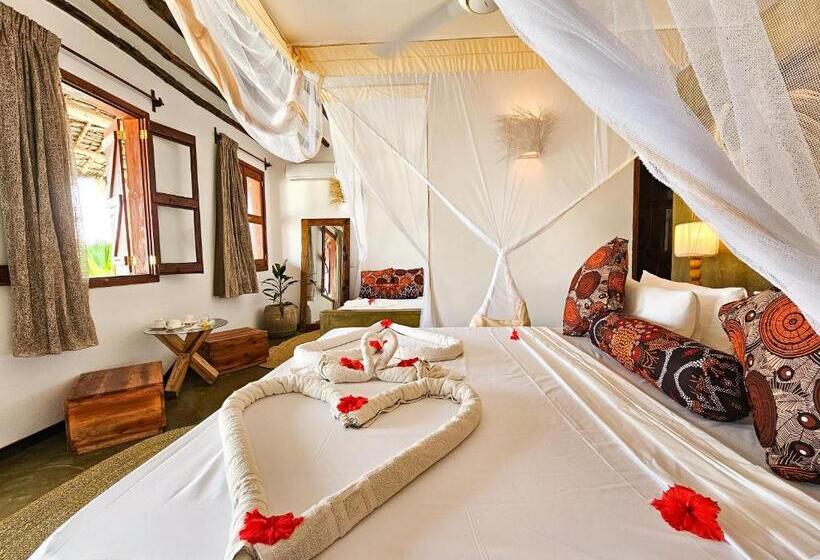 بانگلوی استاندارد با چشم‌انداز دریا, Milele Beach Resort