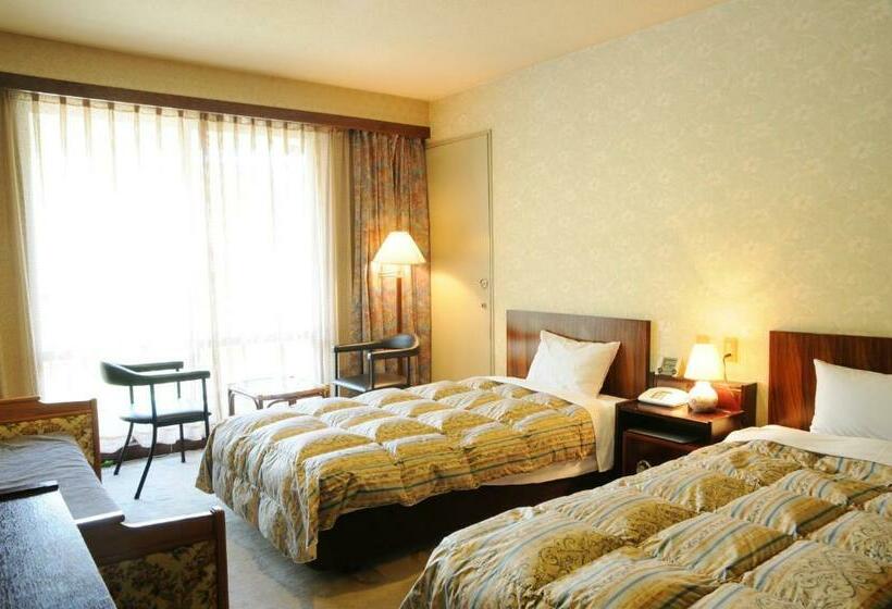 Quarto familia vista montanha, Grace Hakuba