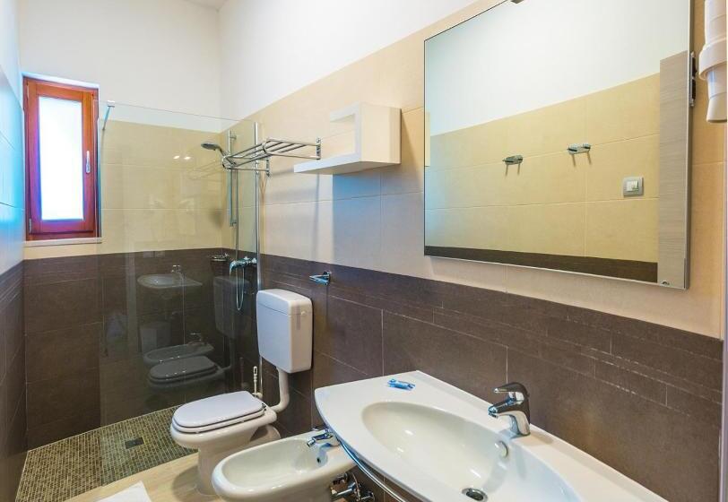 Апартаменты 1 Спальня Вид на Сад, Villaggio Mare Blu