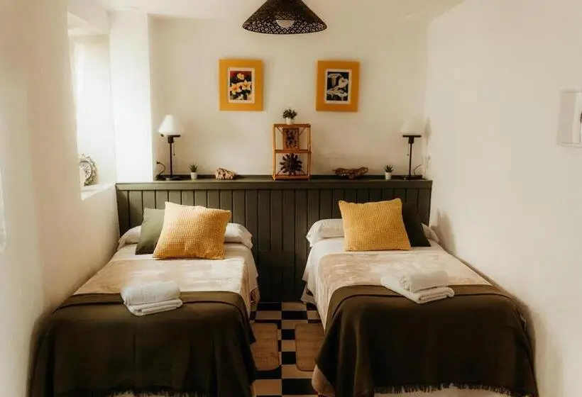 Ekonomiskt Rum, Hostal Africa