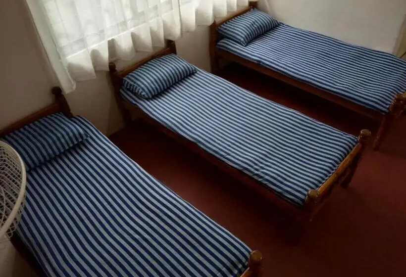 Llit en Habitació Compartida, Highland Inn