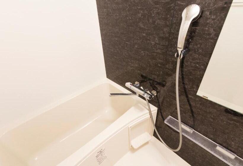 חדר משפחתי, Mr.kinjo In Gusuku