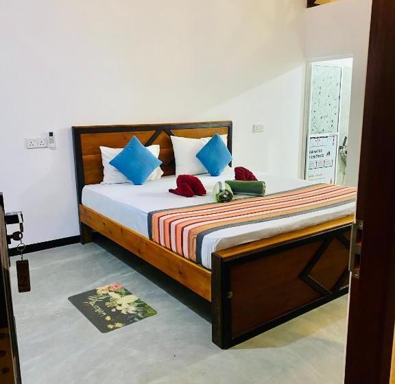 اتاق خانوادگی با چشم‌انداز جانبی دریا, Indika Beach Villa