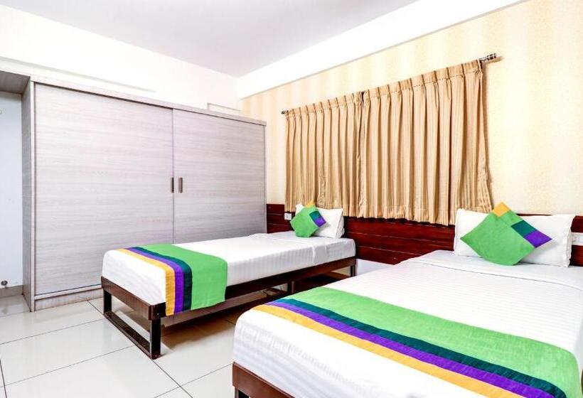 Quarto Superior, Treebo Saga Apartment