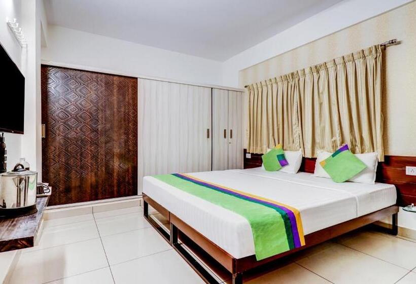 Quarto Superior, Treebo Saga Apartment