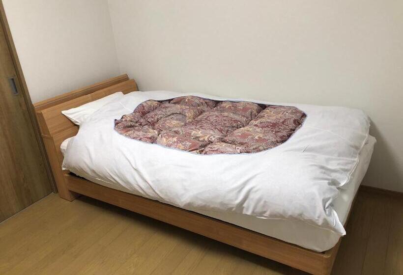 اتاق عادی, Guest House En
