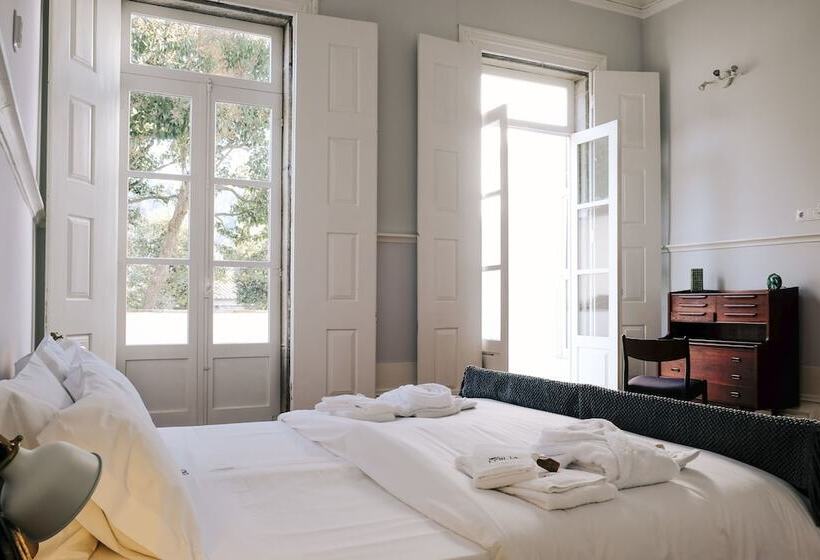 家庭房间共用浴室, Dona Emília Guest House & Studio Apartment Building