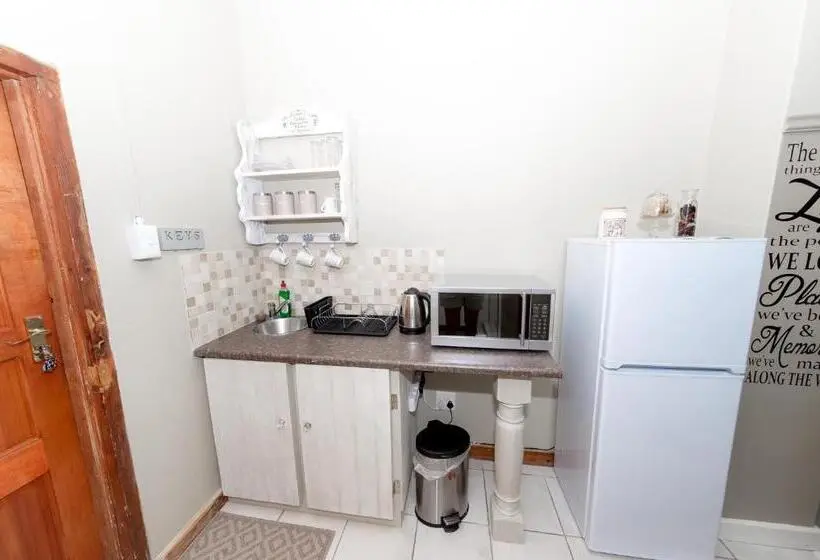 اتاق خانوادگی با چشم‌انداز باغ, Tarentaalrand Guesthouse