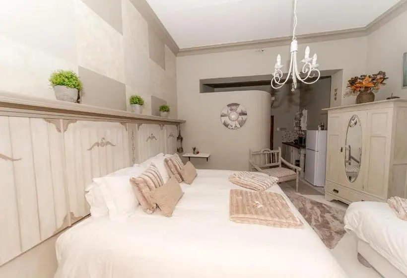 اتاق خانوادگی با چشم‌انداز باغ, Tarentaalrand Guesthouse