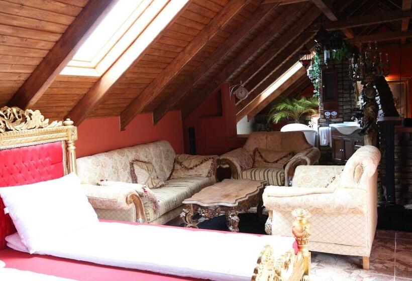 מיטת קינג בסוויטה, Villa Medici Vendégház