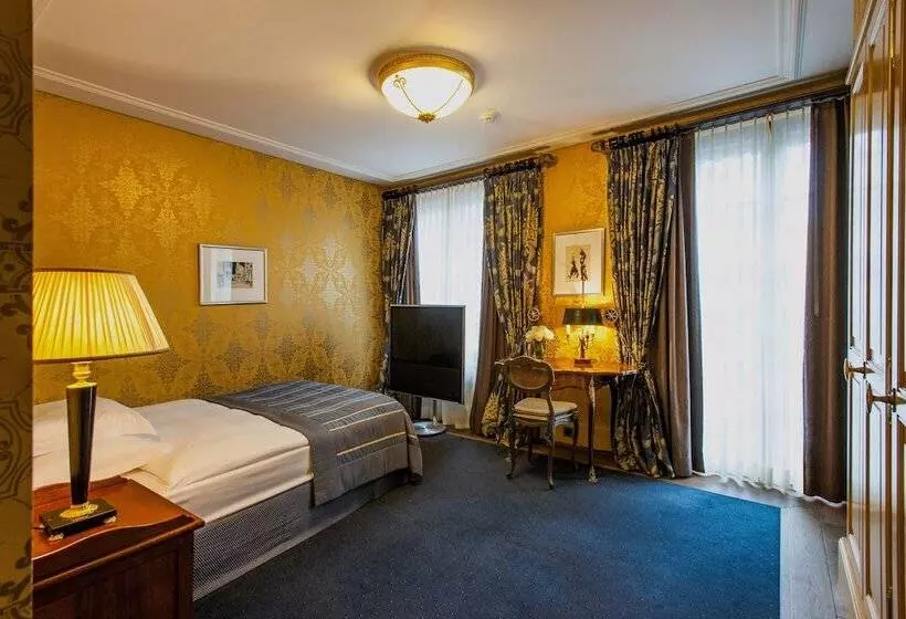 Bisneshuone, Grand Hotel Les Trois Rois
