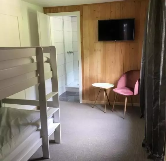 デラックスの４人部屋, Boutique Hotel Bellevue B&b Am Brienzersee Iseltwald Interlaken