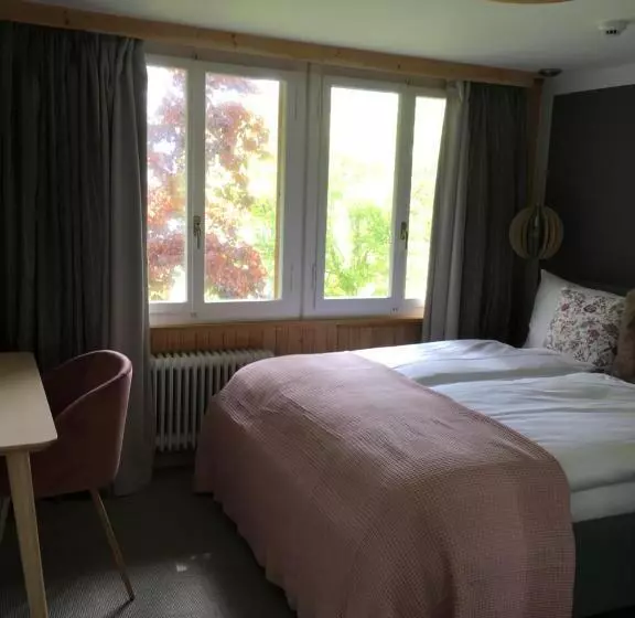 デラックスの４人部屋, Boutique Hotel Bellevue B&b Am Brienzersee Iseltwald Interlaken