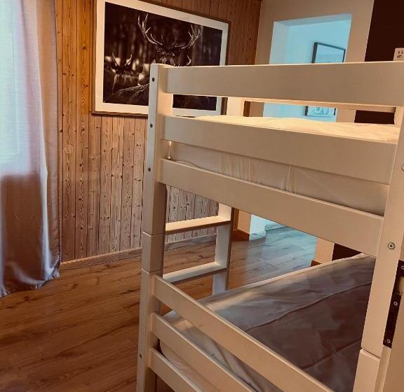 デラックスの４人部屋, Boutique Hotel Bellevue B&b Am Brienzersee Iseltwald Interlaken