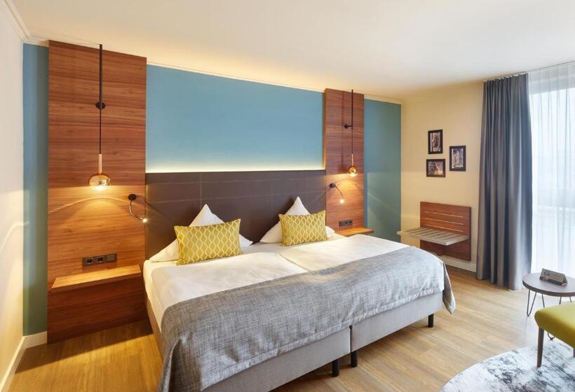 Номер Стандарт, Aquis Grana City