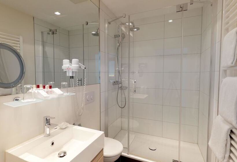 غرفة كومفورت, Goldene Traube