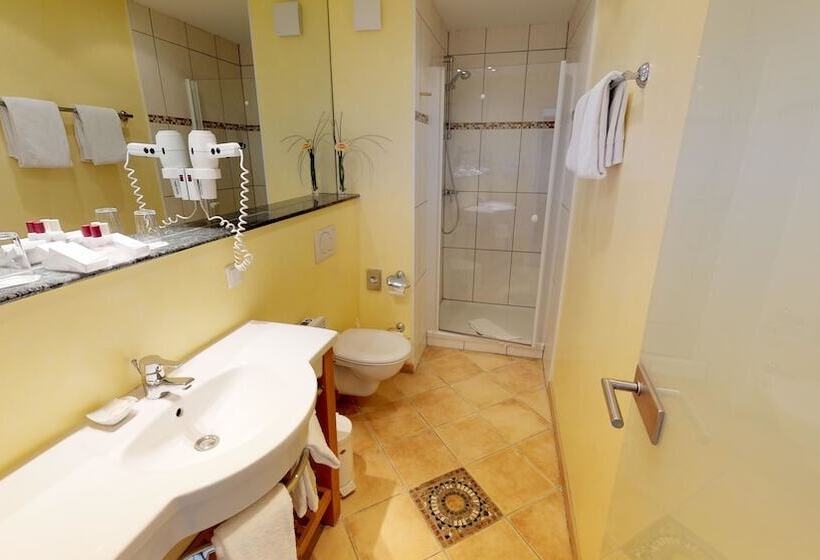 غرفة كومفورت, Goldene Traube