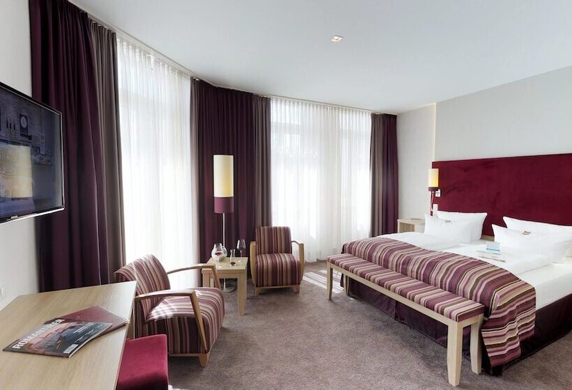 غرفة كومفورت, Goldene Traube