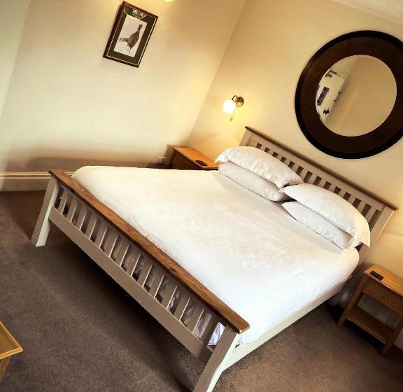 חדר דחוקס עם מיטת קינג, Inn For All Seasons