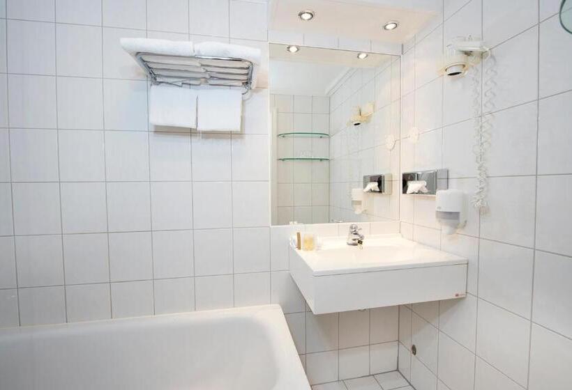 غرفة عائلية, Dr. Holms