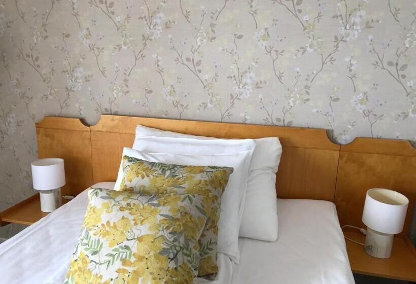 Quarto Estandar Individual, Risør