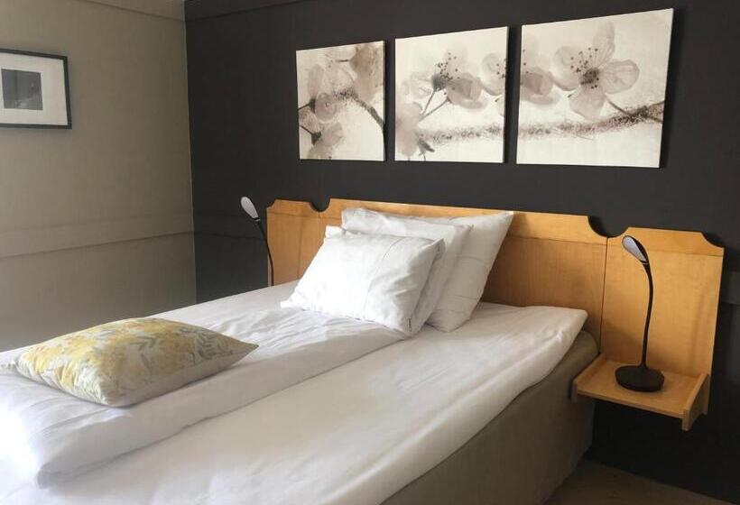 Quarto Estandar Individual, Risør