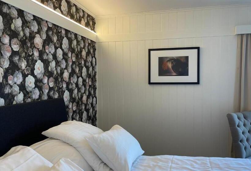 Quarto Estandar, Risør