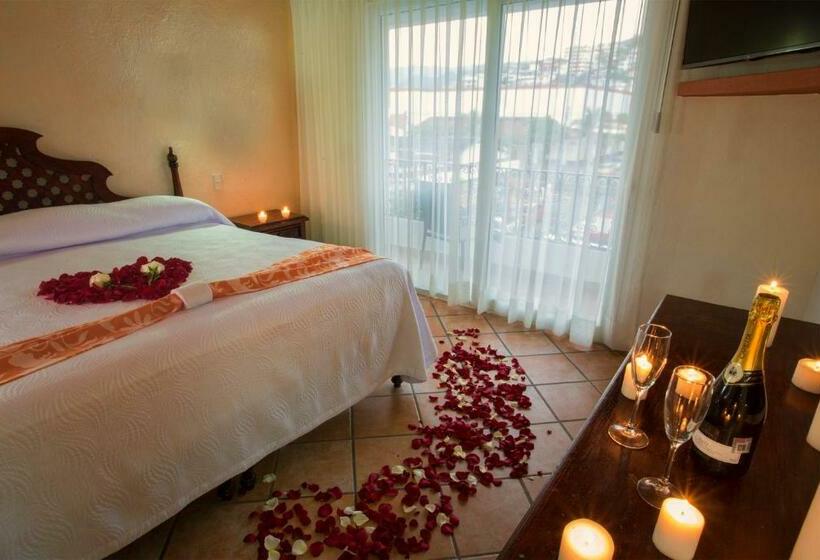 غرفه قياسيه سريرين مزدوجين, El Pescador