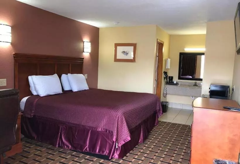 キングサイズベッドのスタンダードルーム, Americas Best Value Inn Indianola