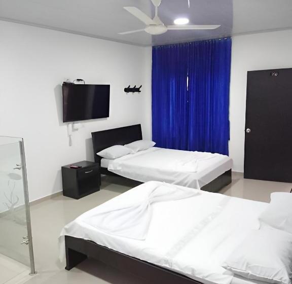 Habitación Cuádruple Deluxe, Perla Azul Boutique