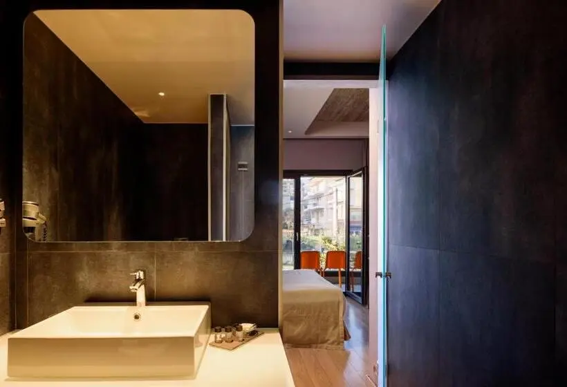 Chambre Confort Vue Ville, Essence