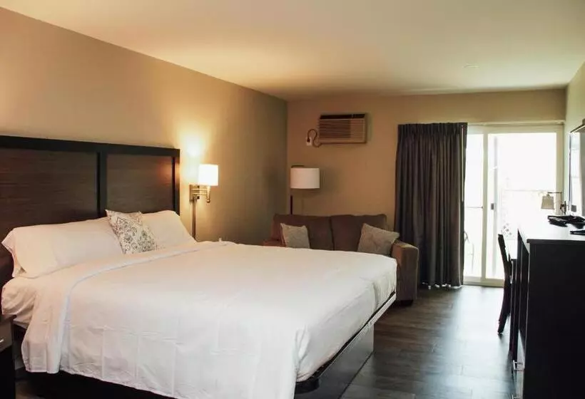 キングサイズベッドのスタンダードルーム, Country Squire Inn And Suites