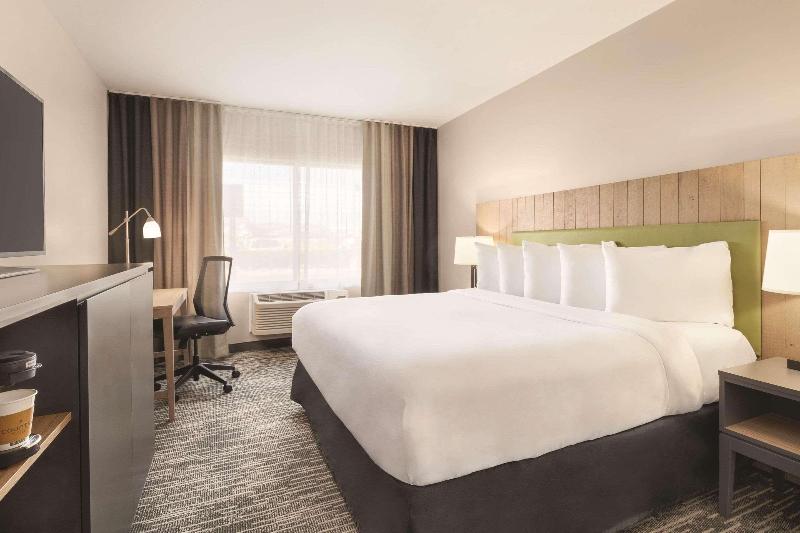 身障者適用キングサイズベッドルーム, Country Inn & Suites By Radisson, Sevierville Kodak, Tn