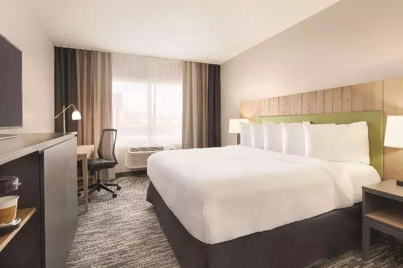 身障者適用キングサイズベッドルーム, Country Inn & Suites By Radisson, Sevierville Kodak, Tn
