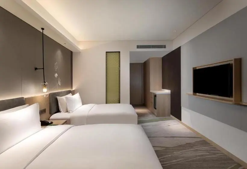 キングサイズベッドのスタンダードルーム, Holiday Inn Guiyang City Center, An Ihg