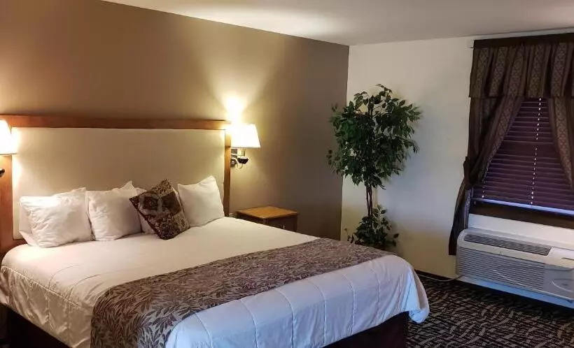 キングサイズベッドのスイートルーム, Stagecoach Inn & Suites