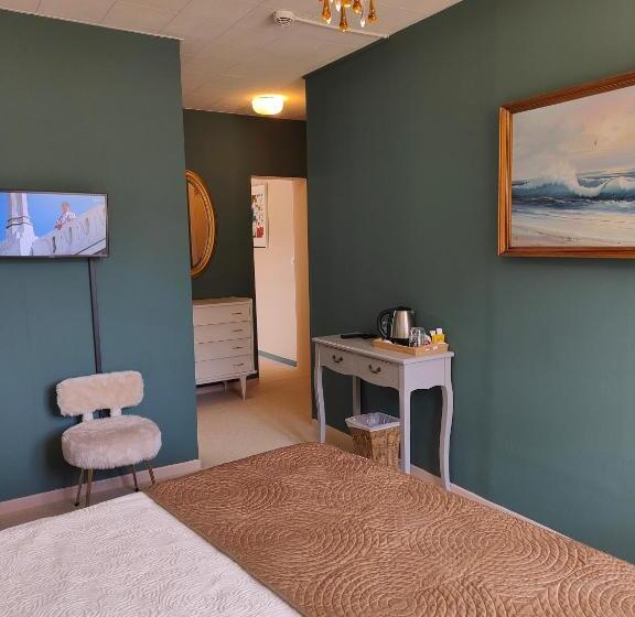 סוויטה דלוקס, Les Rochers