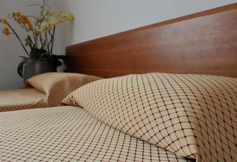 חדר סטנדרט לשלושה, Filanda