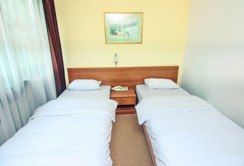 اتاق اکونومی, Grand