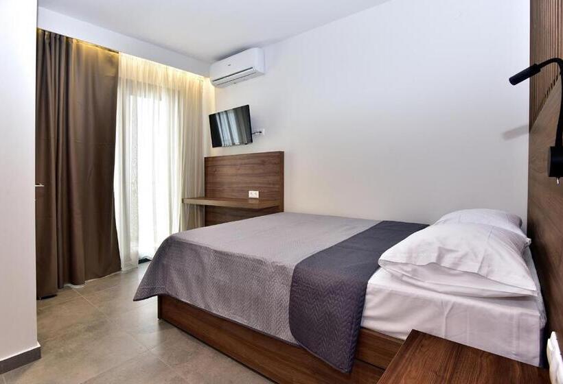 غرفة ديلوكس ثلاثية, Eutopia