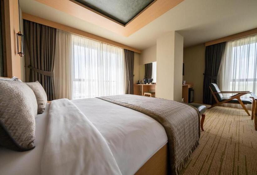 חדר דלוקס, Avec