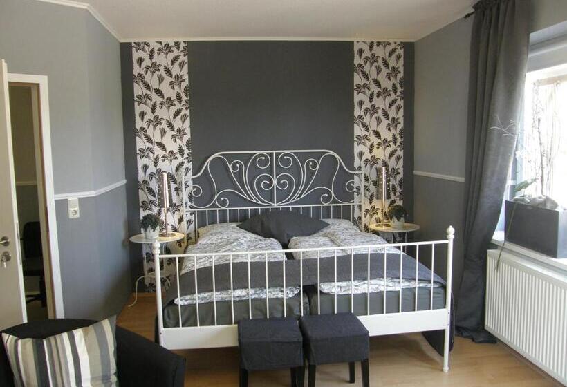 غرفة ديلوكس, Land & Stil