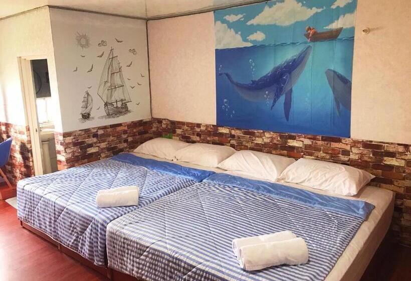 اتاق استاندارد چهار تخته با چشم‌انداز دریا, 海人生海景民宿cest La Vie