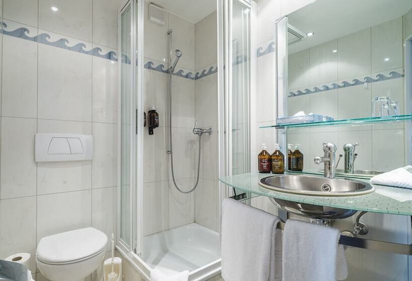 标准单人间, The Rex