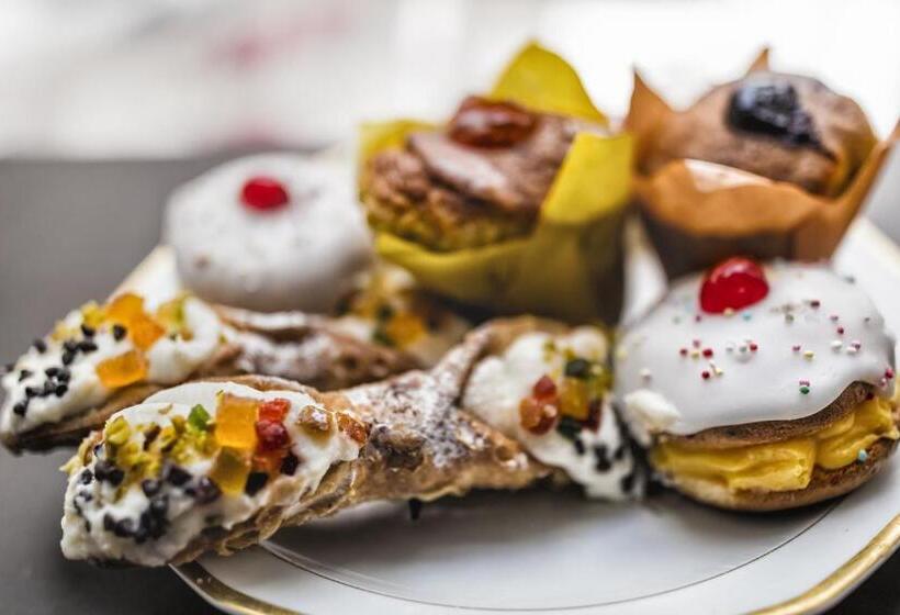 جناح جونيور مزوَّد بشرفة, Manzoni 46   Ospitalità Siciliana