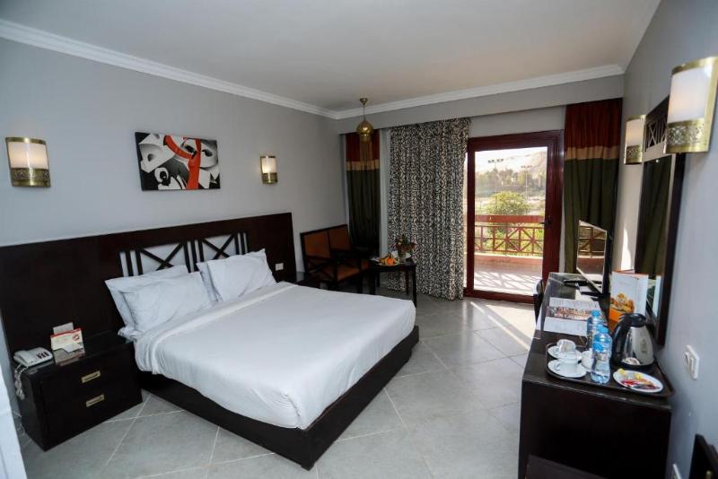 اتاق استاندارد سه تخته با چشم‌انداز باغ, Pyramisa Island Hotel Aswan